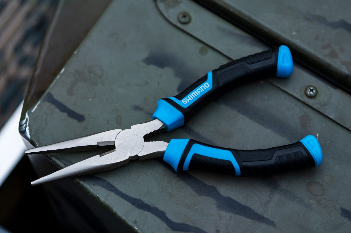 [lifestyle] image of product BRUTAS SILVER NICKEL LONG NOSE PLIERS