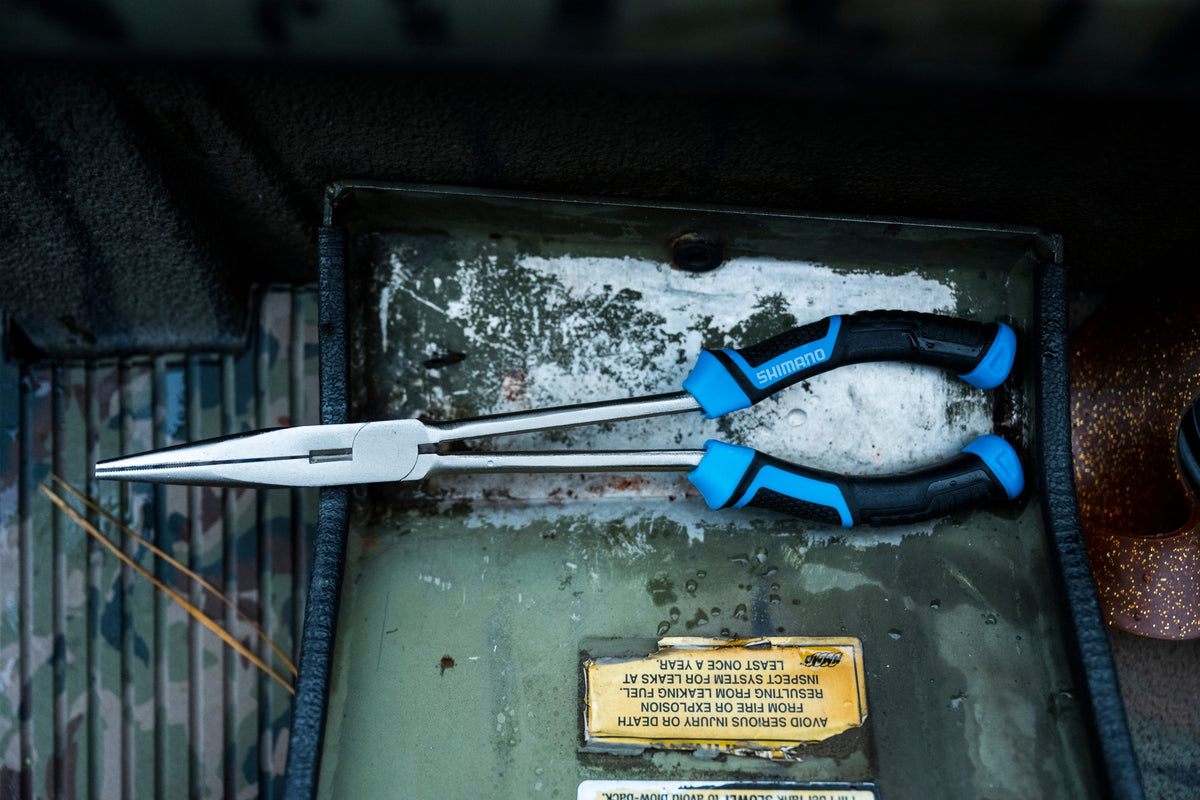 [lifestyle] image of product BRUTAS SILVER NICKEL LONG NOSE PLIERS
